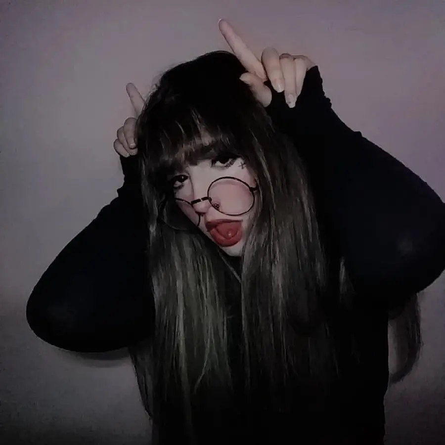 Download the profile of a naughty girl with glasses and long hair in original quality