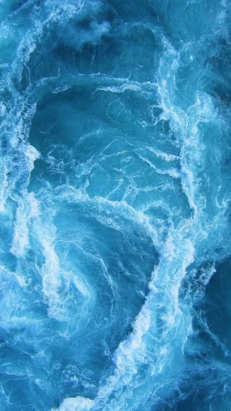 Free download of a photo of the raging and tangled ocean waves for use on Instagram
