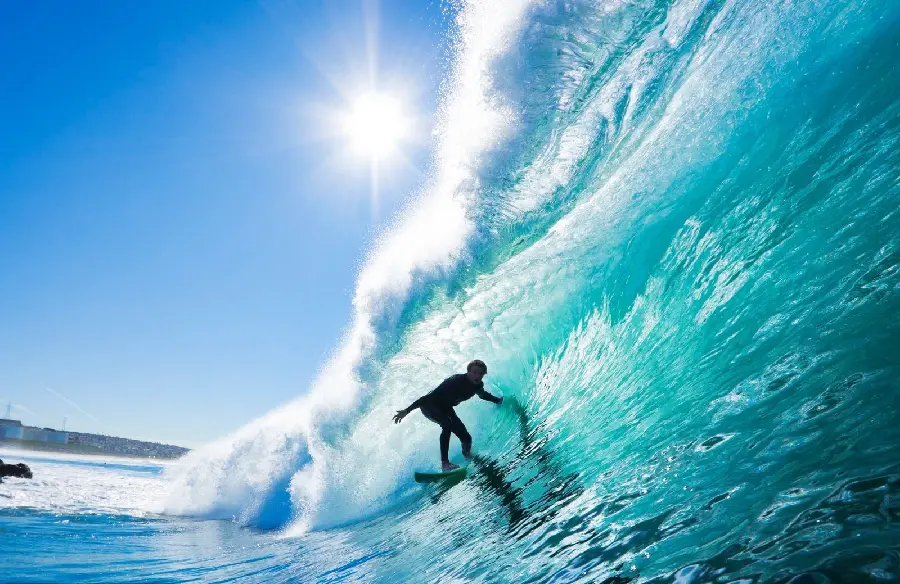 A beautiful and special image of ocean waves and a surfer
