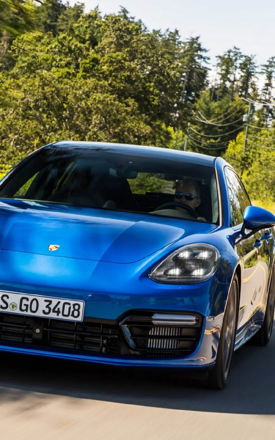 Photo and background of the 6-cylinder Porsche Panamera with blue color