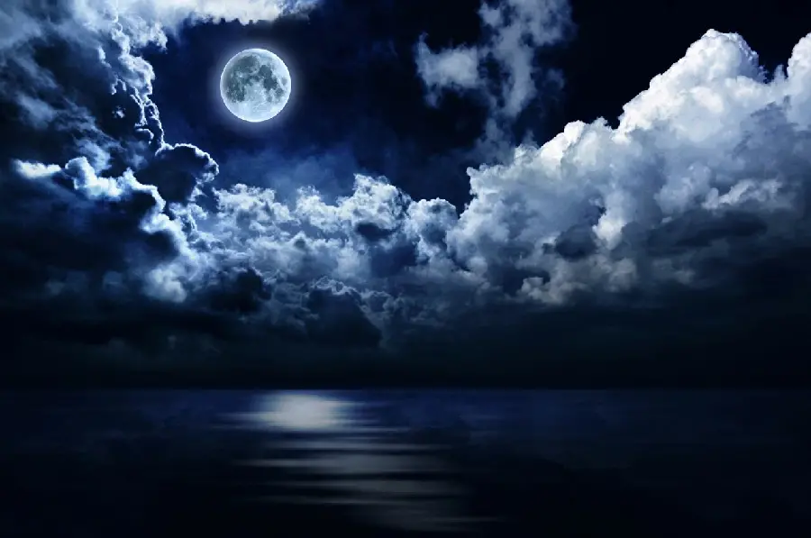 Beautiful moonlight background with dark and light clouds
