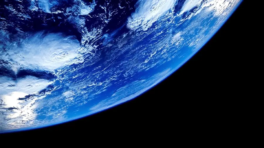 High quality photo background of the right corner of the real light blue Earth from NASA