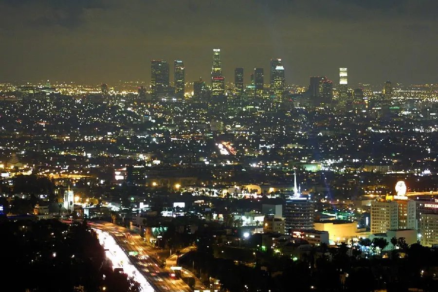 Wallpaper of downtown Los Angeles with commercial and office towers at night