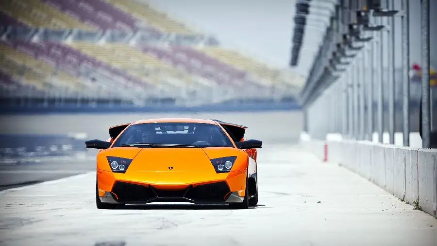 Download Interesting Photo of the Famous Orange Lamborghini Murcielago Front for Desktop Wallpaper
