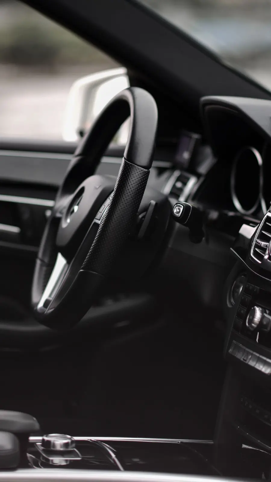 High quality photo of a Mercedes-Benz E300 with a comfortable steering wheel