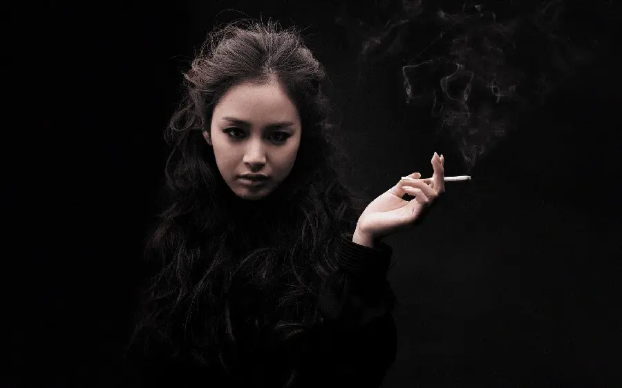Attractive girl with a cigarette in her hand in Full HD quality for laptops and profiles