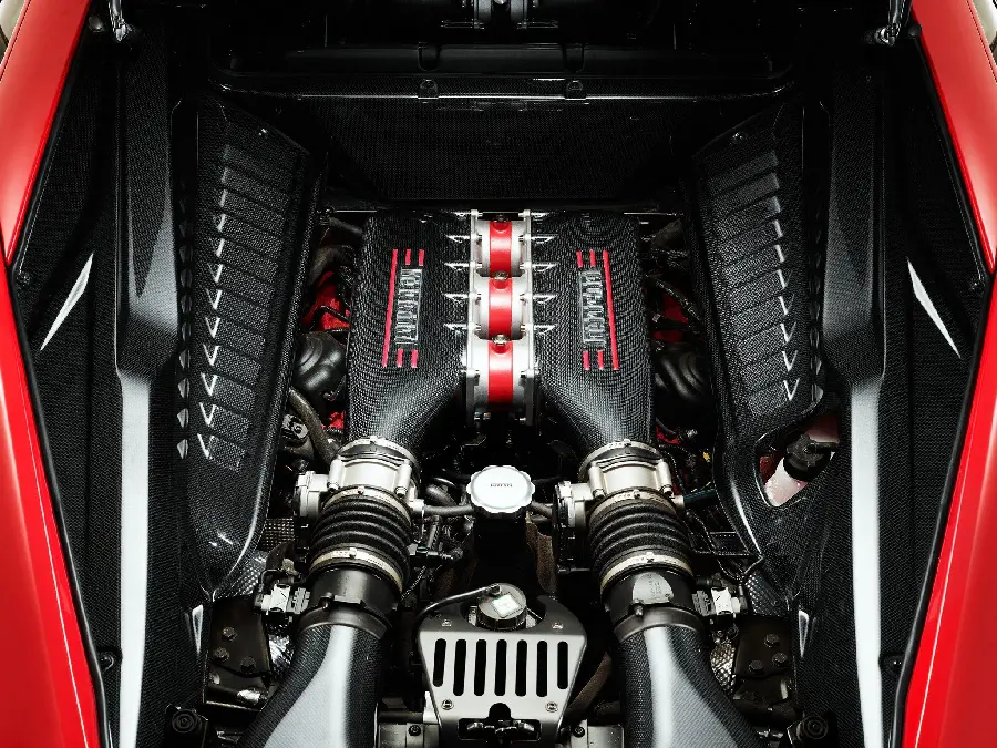 Close-up Photo of Ferrari Engine and Cylinders