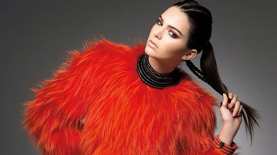 Photo of Kendall Jenner in a red dress and ponytail