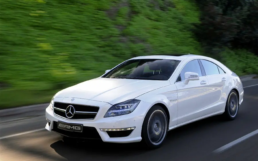 Photo of Mercedes Benz AMG model with white color and sedan model