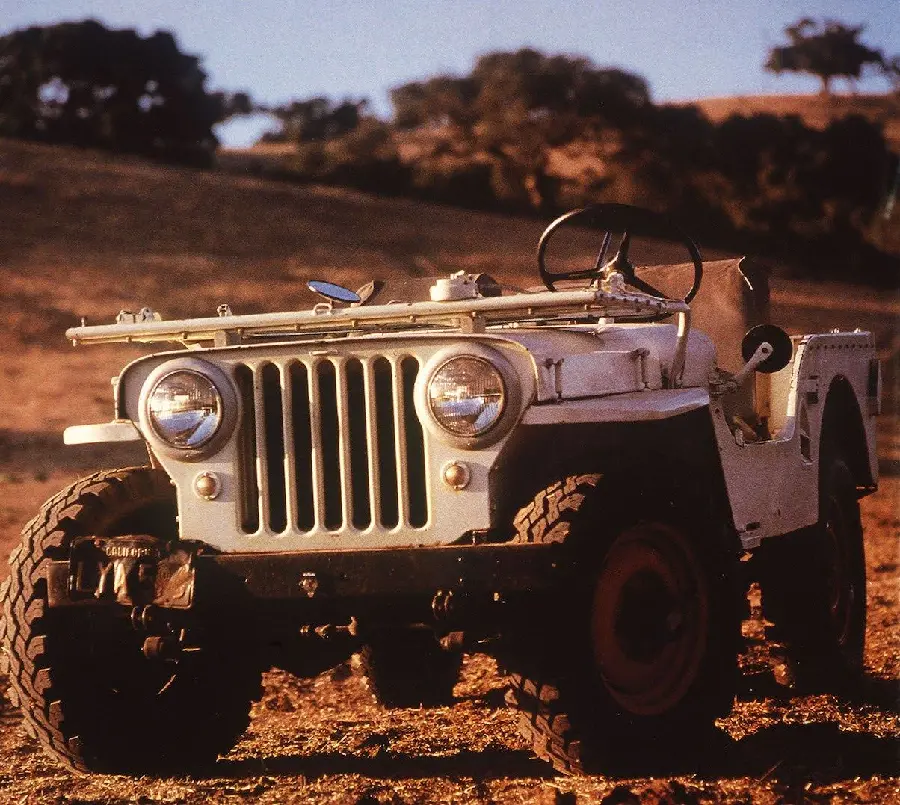 Artistic photo of a white Jeep Km from the front