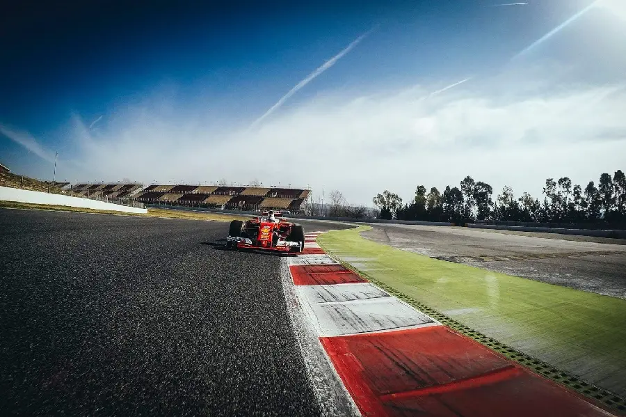 Ferrari F1 car background from the front on a wide track from an interesting angle