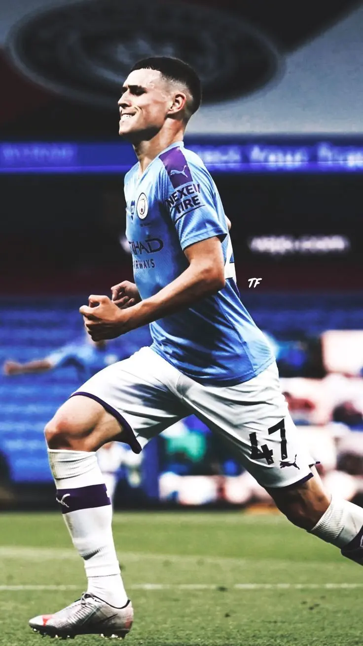 Phil Foden photo in Manchester City blue kit