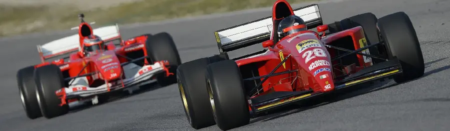 Interesting image of two Ferrari F1 cars competing on the race track