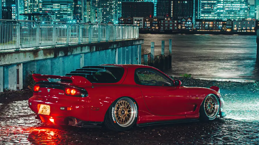 Download mobile wallpaper with a red theme with a Mazda car design