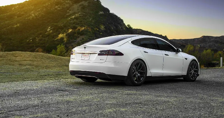 Photo of the back of the Tesla electric car with beautiful lights