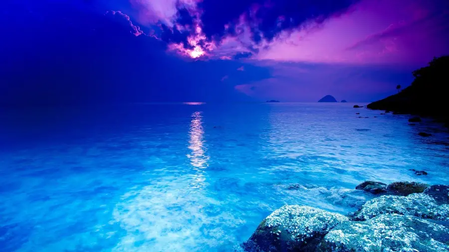 A unique digital image of the ocean with a blue and purple theme in full HD quality