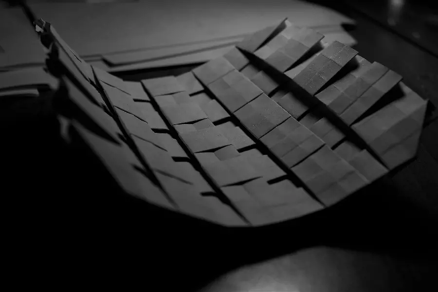 A gray background made of a piece of square and flexible plastic