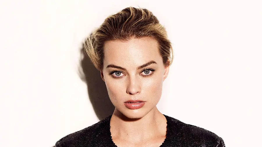 Beautiful actress Margot Robbie's spectacular background with a bright and white background