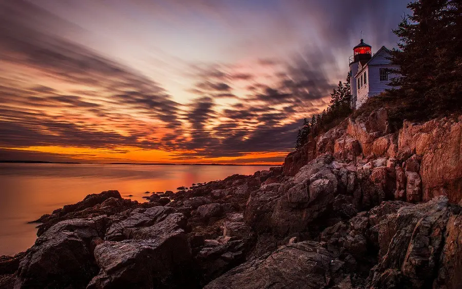 Photo of the coastal landscape at Acadia National Park at sunset