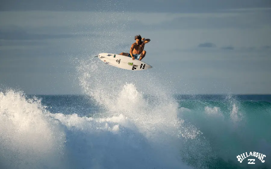 Beautiful and exciting photo of surfing on an ocean wave