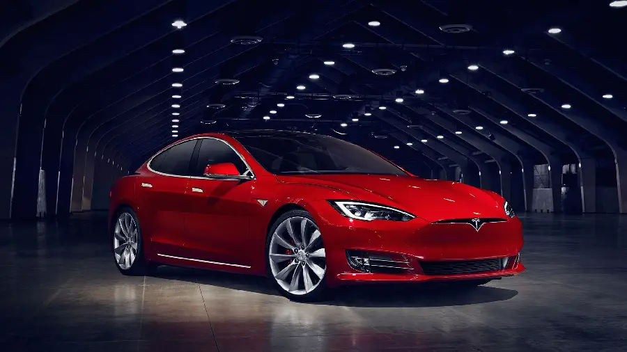 Photo of a charming red Tesla