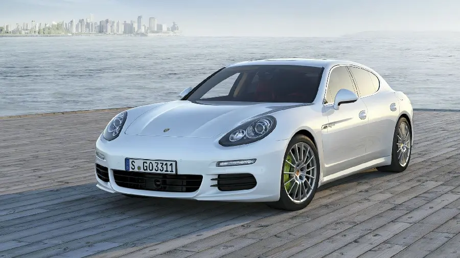 High quality white Porsche Panamera car photo on the road