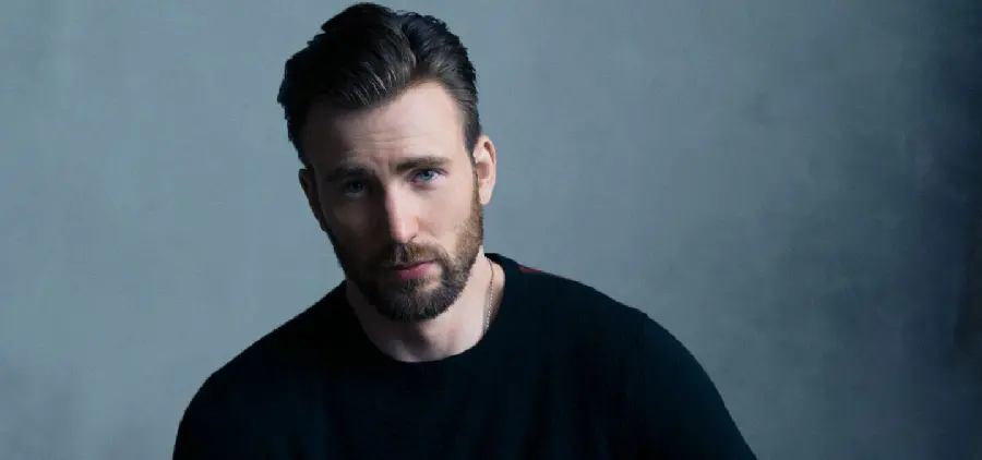 Photo of Chris Evans, handsome in a black shirt for a profile