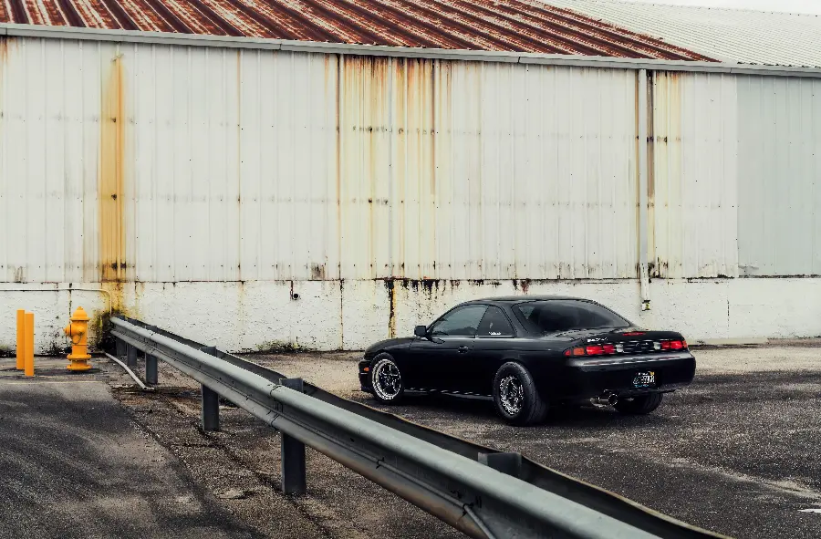 Photo of the Japanese car Nissan 240sx model with black and black color