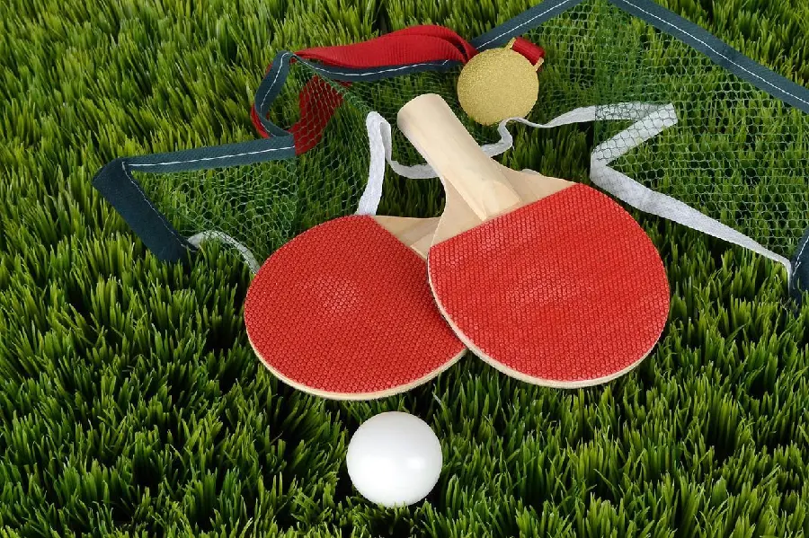 HD profile photo with table tennis racket and ball