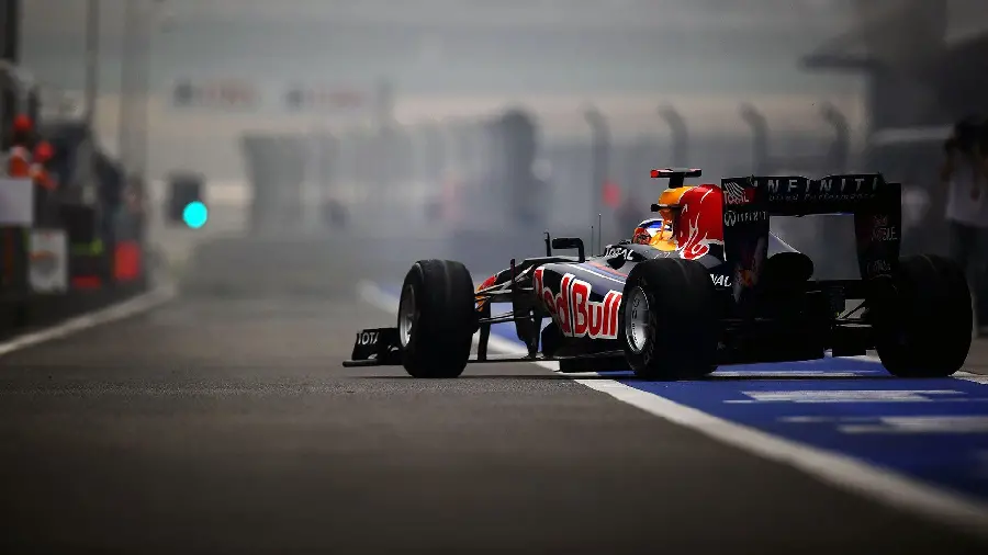 Photo of Ferrari Formula One on the race track from behind with the ability to use in Instagram posts and stories