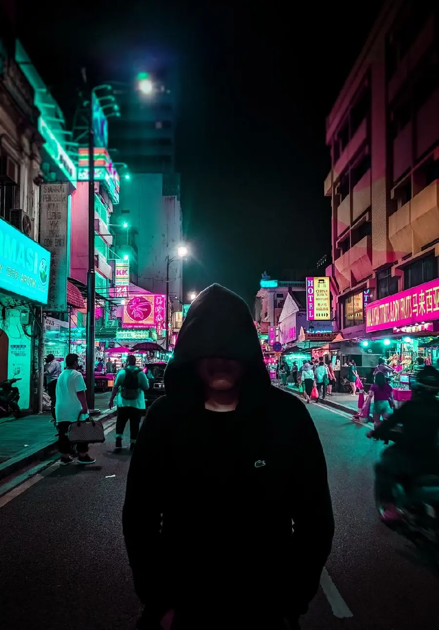 Black hat hacker profile photo on the street in HD quality