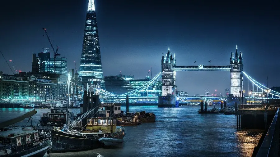 Photo of London at night and the beautiful Tower Bridge bathed in light