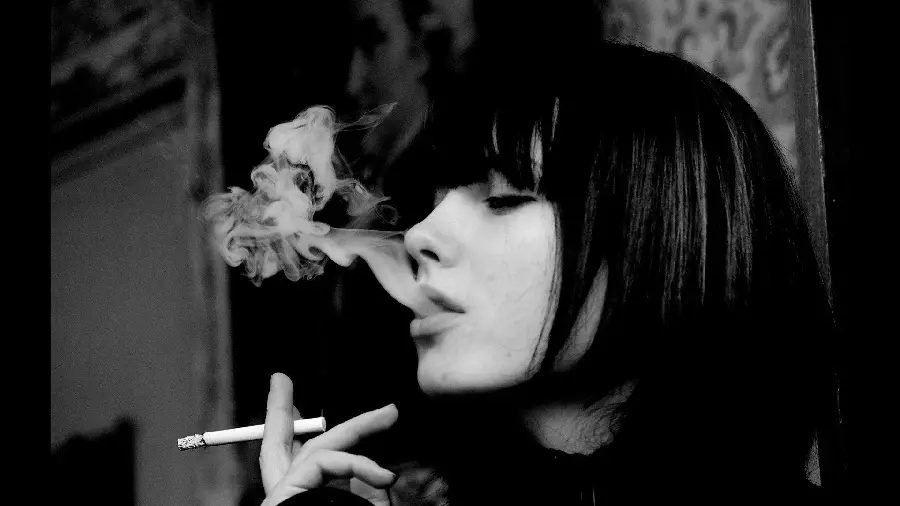 Download attractive image of a girl with bangs smoking