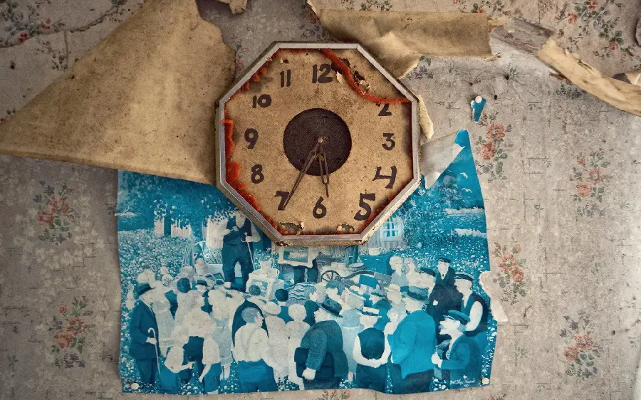 Attractive stock photo with a wall clock theme and a torn blue image of a crowd of people for wallpaper