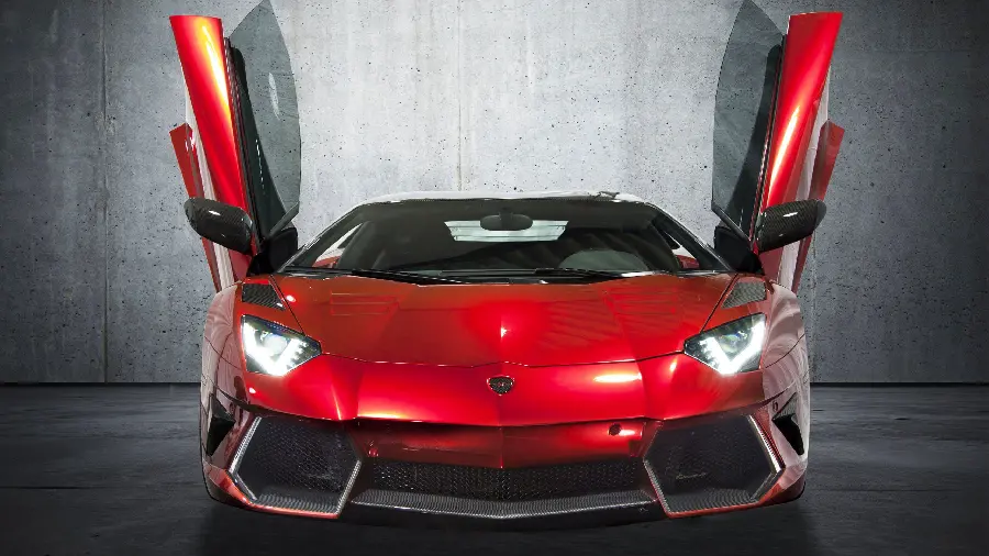 Photo of Lamborghini super sports car with red color and open doors
