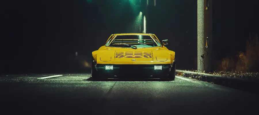 Orange background of old and classic Mazda car