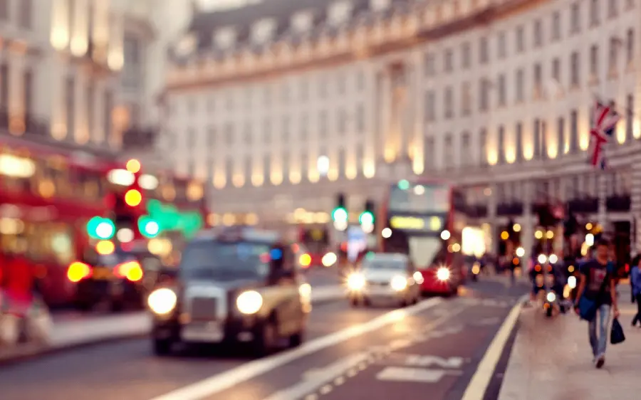 Photo of the famous London street with old and classic cars