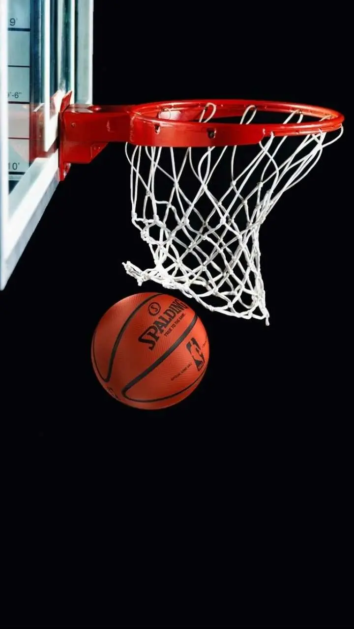High-quality photo of a close-up of a basketball ball on a black background