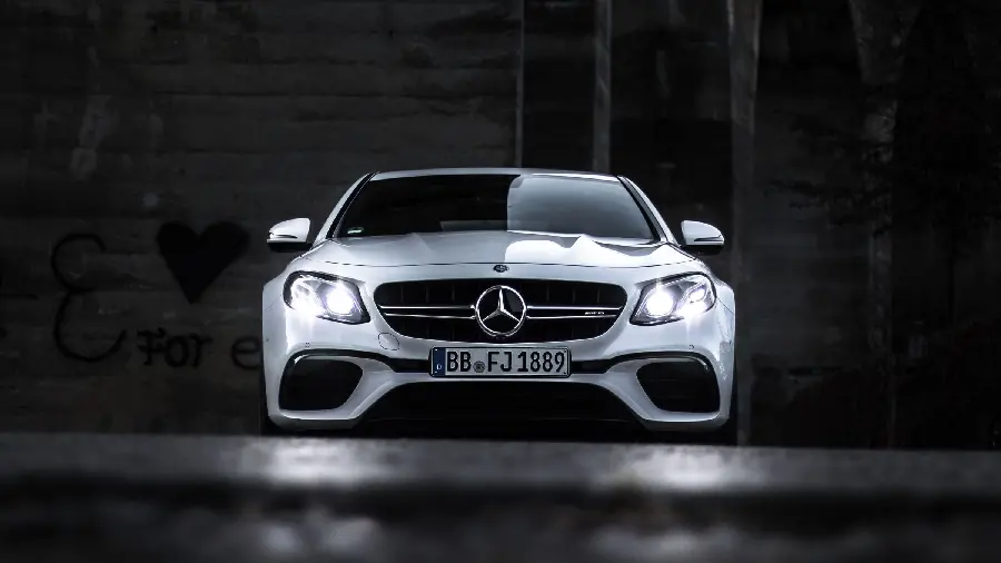 White Mercedes Benz AMG E63 in the Dark