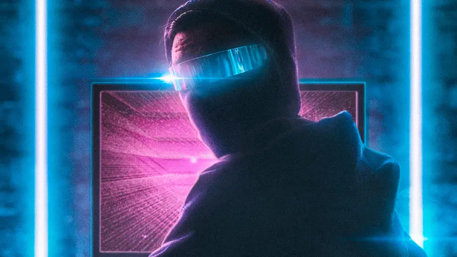 Download a photo of a hacker with a neon mask for iPhone wallpaper