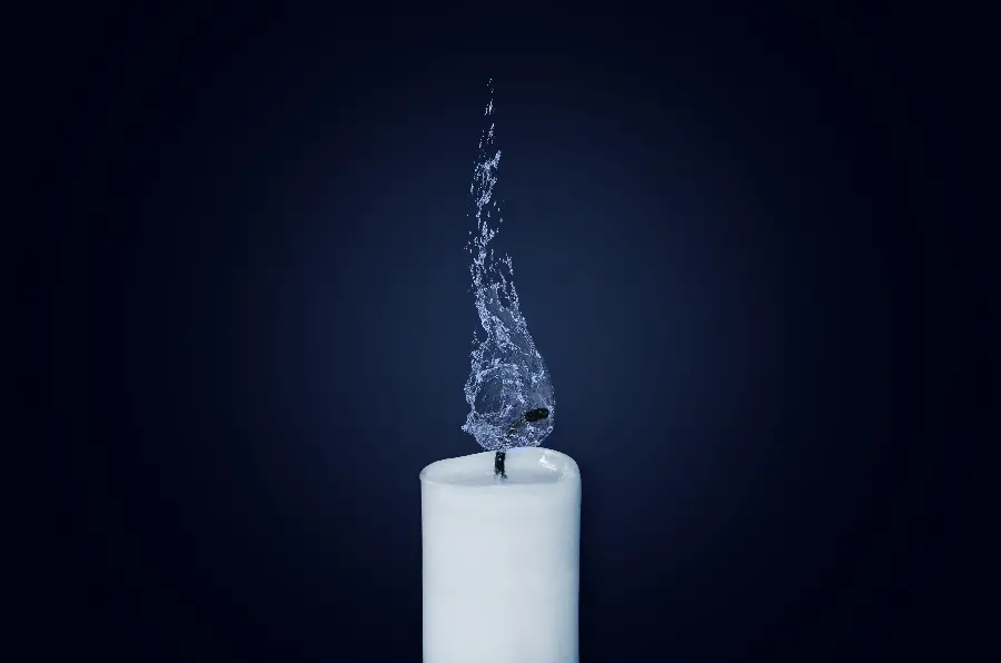 Interesting wallpaper of a white candle with a blue flame for the background of the phone and mobile