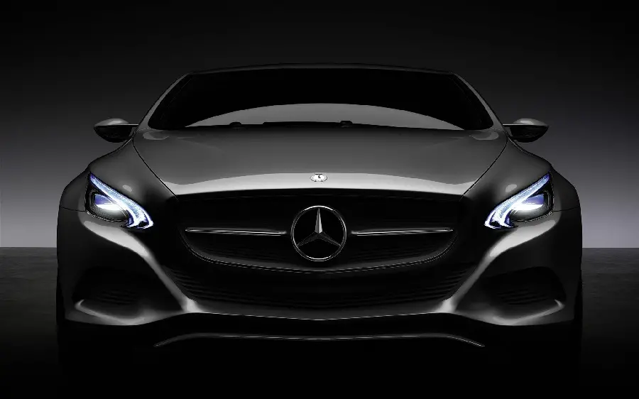 Wallpaper of a Mercedes-Benz with a front window and dazzling lights