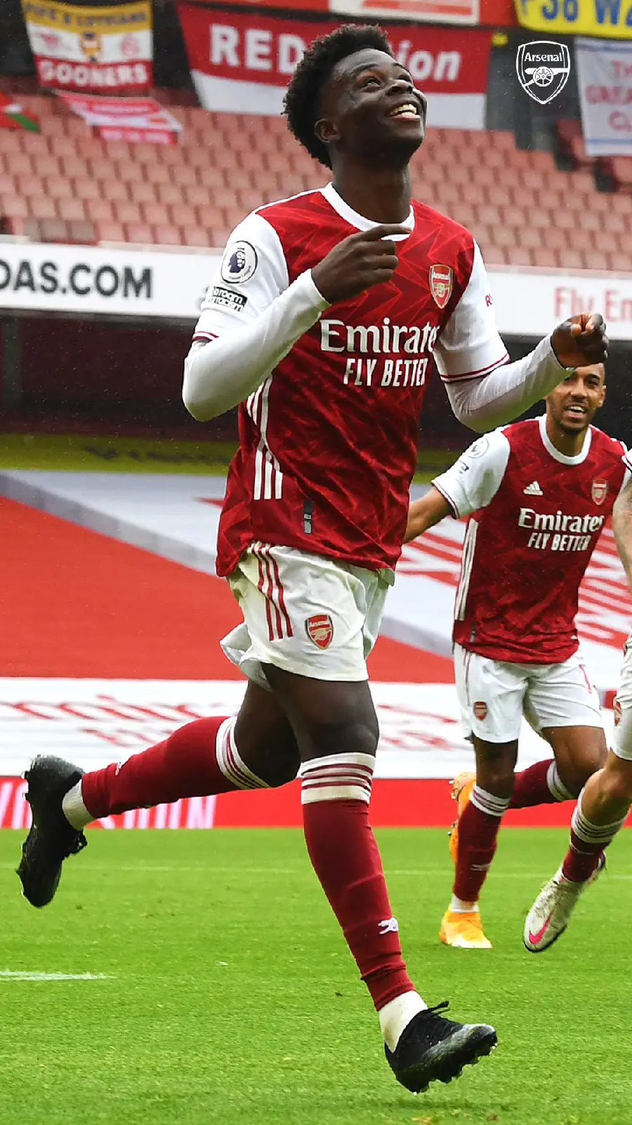Bukayo Saka celebrating a goal in Arsenal