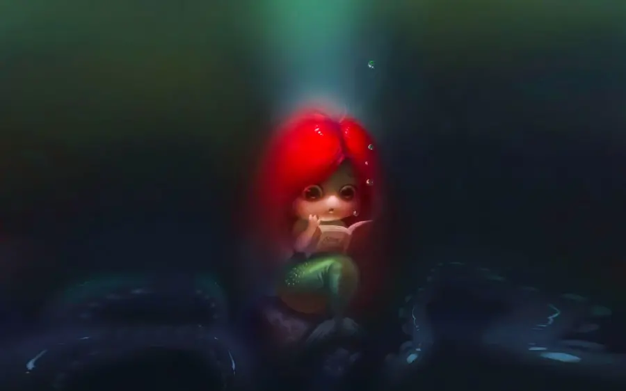 Picture of a mermaid girl with red hair reading a book