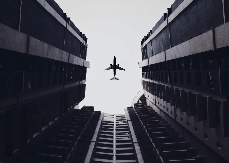 A super beautiful wallpaper of a plane flying over the sky for Windows 11