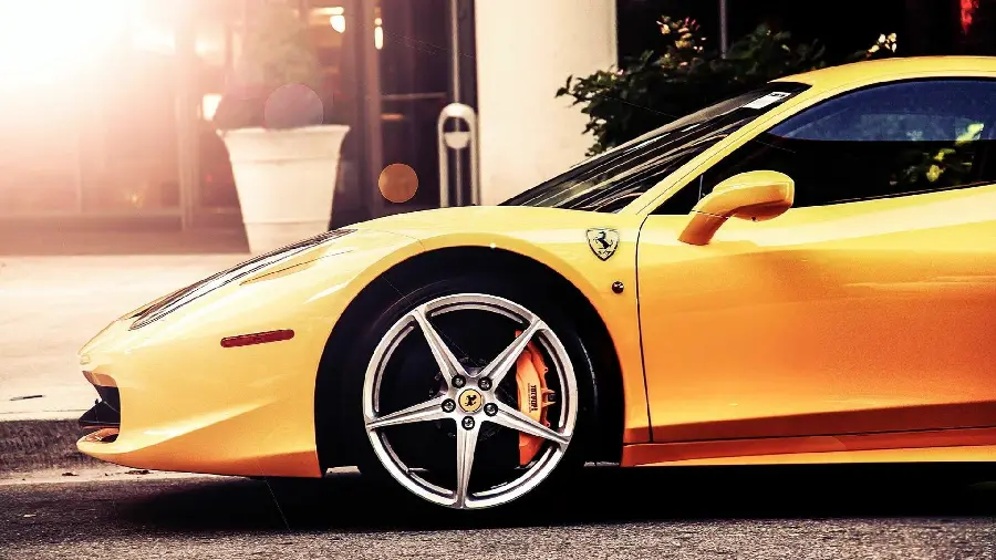 Ferrari car wallpaper with yellow color and special rims