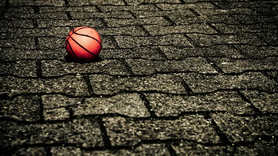 Background of a basketball ball on the street pavement