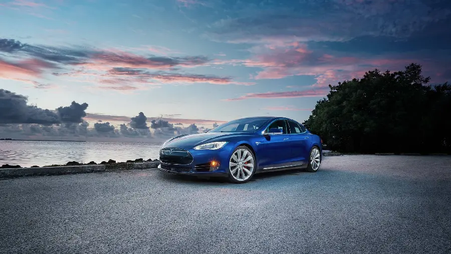 Photo of a stylish blue Tesla