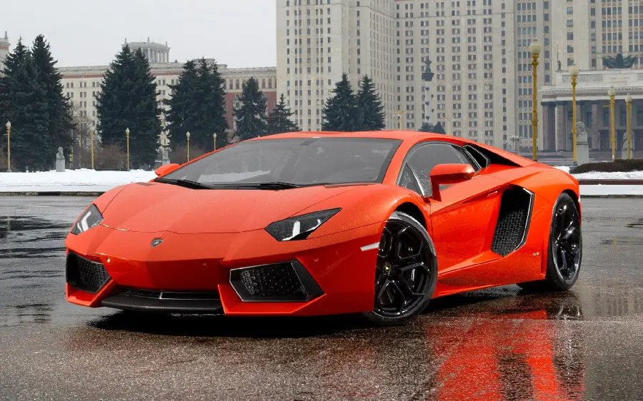 Red Lamborghini photo on wet and rainy road for profile and background