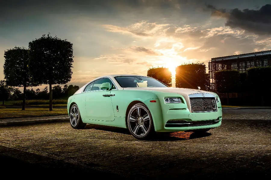 Stylish and classy background photo of a white and attractive Rolls Royce car